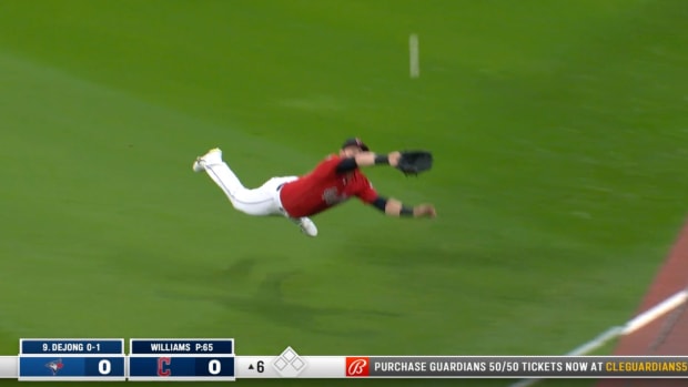 Kole Calhoun dives to make a catch